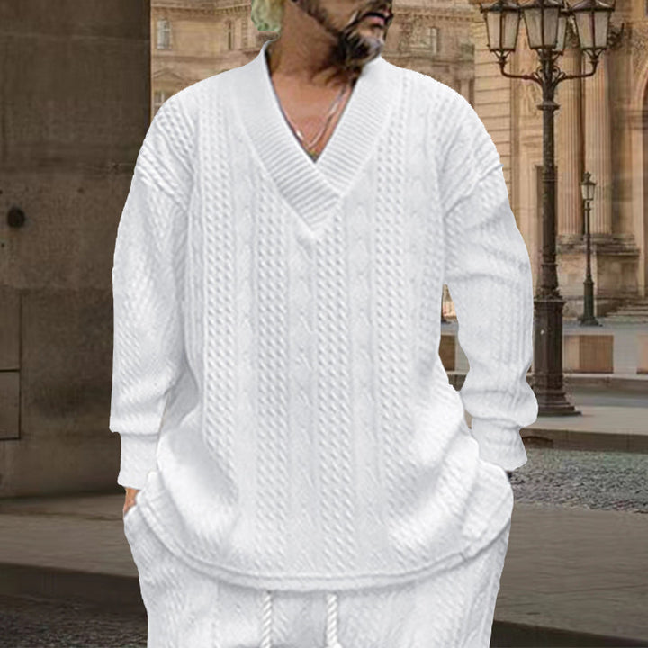 Herren nan grob gestrickter V-Ausschnitt-Pullover mit Zopfmuster und relaxed Fit Echo Archiv