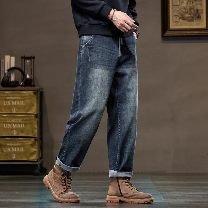 Herren Weite gerade geschnittene Denim-Jeans mit Used‑Wash und Umschlagbund Echoarchiv