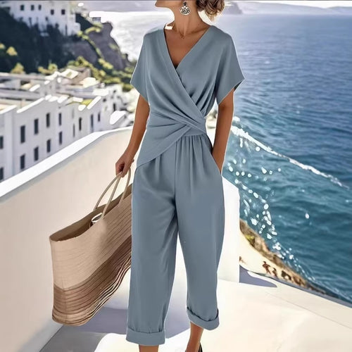 Damen Eleganter Jumpsuit mit Wickeloptik und breiten Beinen Echo Archiv