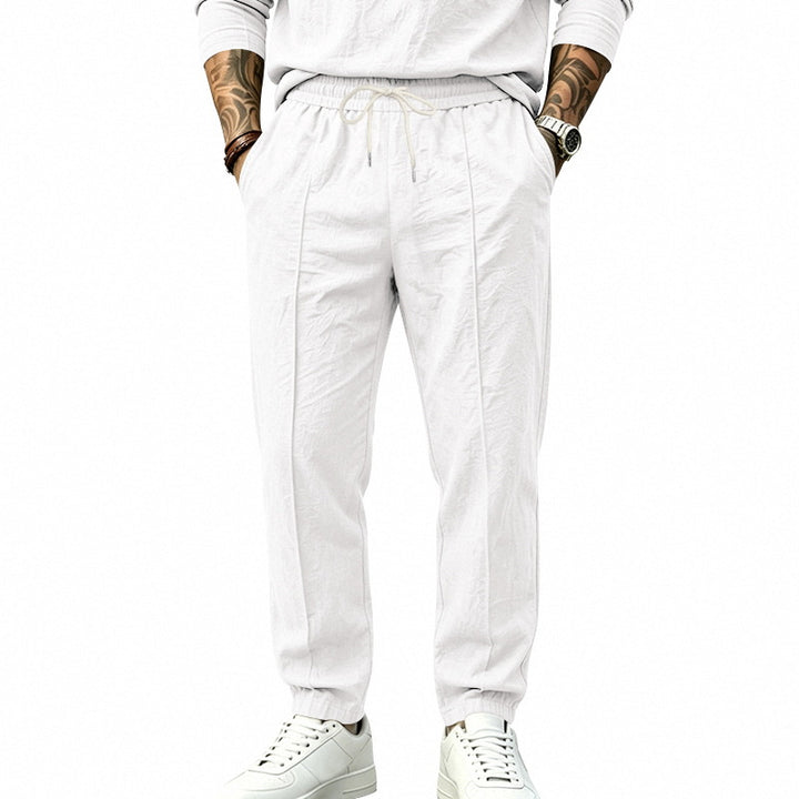 Herren Leichte Tapered-Jogginghose mit Bundfalten, elastischem Tunnelzug und Seitentaschen Echoarchiv