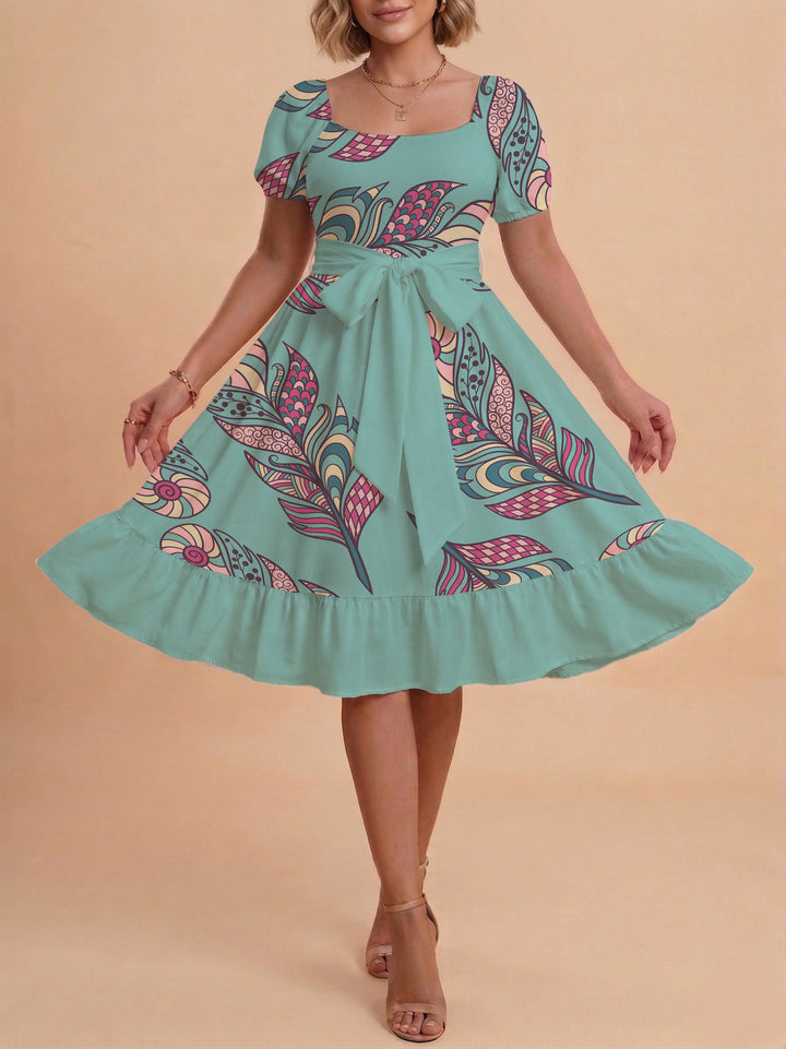 Damen modernes Blumenkleid mit elegantem Taillengürtel und asymmetrischem Saum Echo Archiv