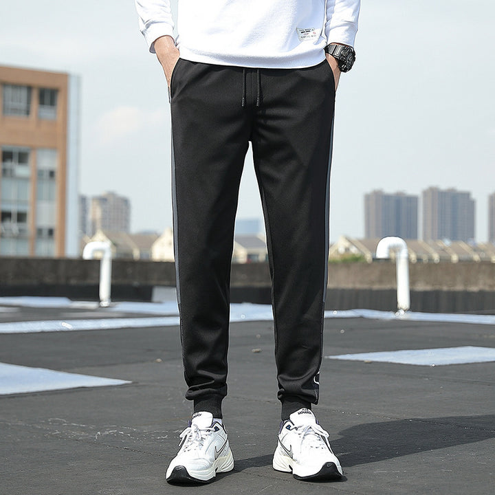 Herren Slim‑Fit Trainingshose mit elastischem Bund, Kordelzug und gerippten Bündchen Echoarchiv