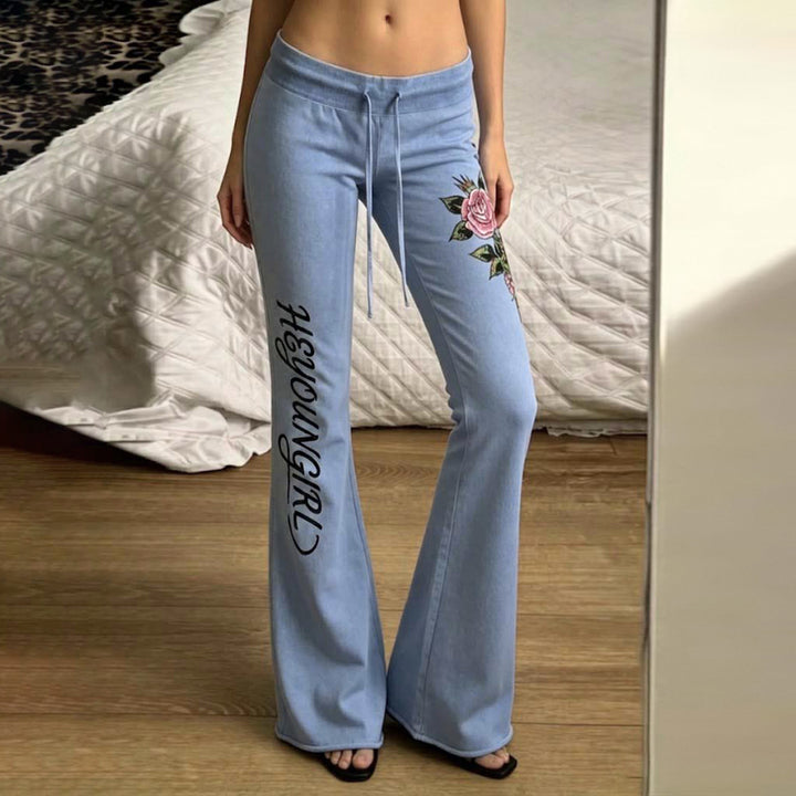 Damen nan ausgestellte Jersey-Sweathose mit Kordelzug, floralem Seitenprint und Statement-Schriftzug Echo Archiv