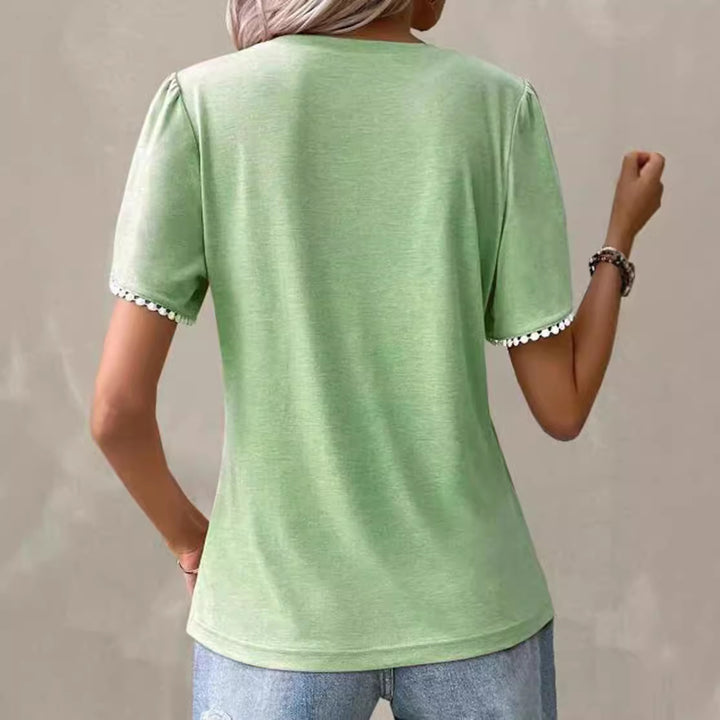 Damen nan Rundhals-Shirt mit dekorativer Kellerfalten-Front, Flatterärmeln und Pompon-Borte Echo Archiv