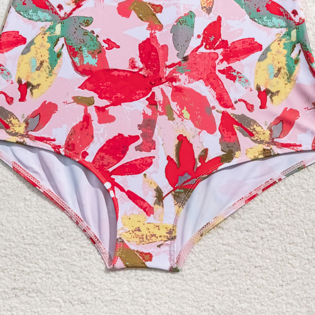 Damen Einteiliger Badeanzug mit floralem Muster Echo Archiv