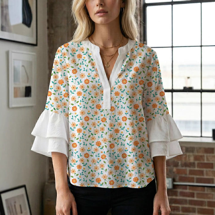 Damen Blusenshirt mit voluminösen Ärmeln und kreativem Druckdesign Echo Archiv