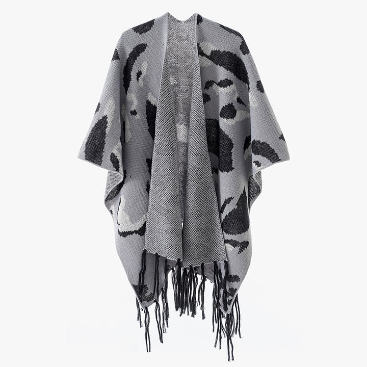 Damen Oversize-Strickponcho mit animalischem Jacquard und Fransensaum Echo Archiv