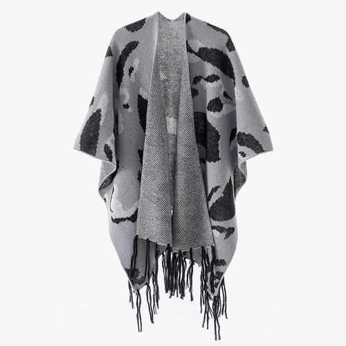 Damen Oversize-Strickponcho mit animalischem Jacquard und Fransensaum Echo Archiv