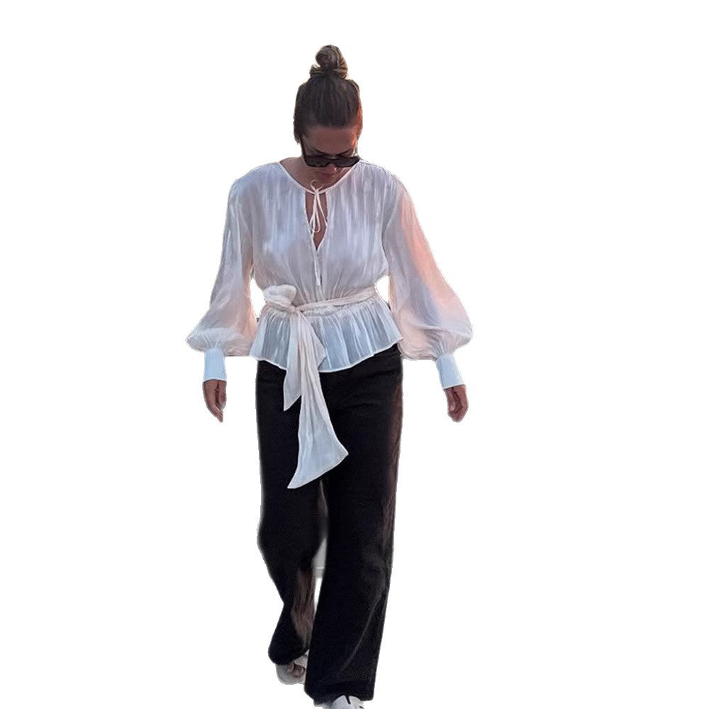 Damen Elegante Wickelbluse mit Bindegürtel und voluminösen Ballonärmeln Echoarchiv