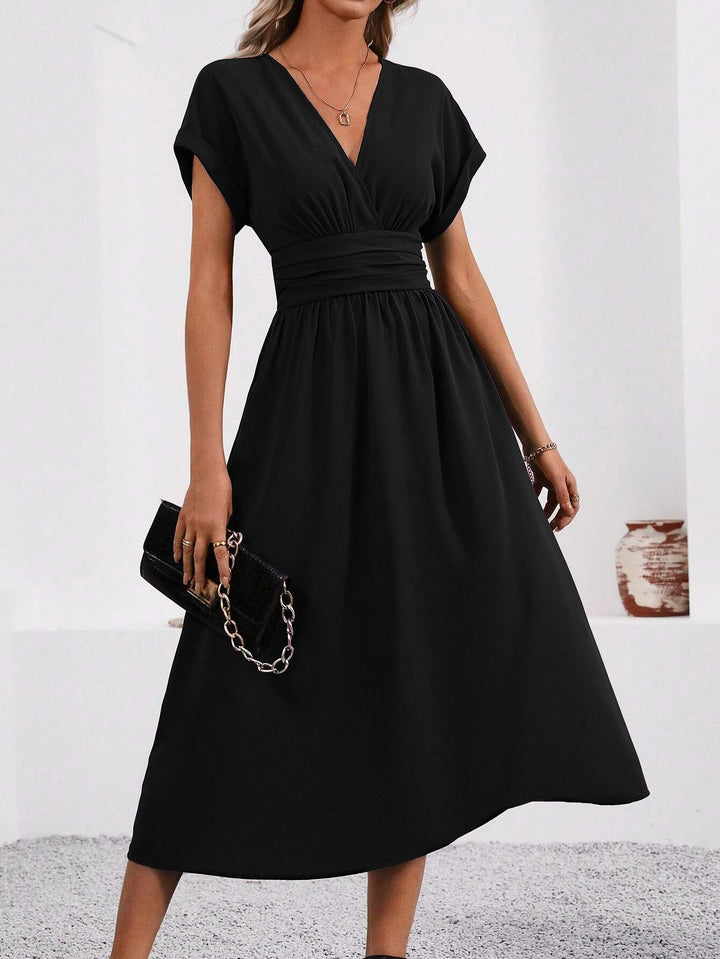 Echoarchiv | Elegante Wickelkleid
