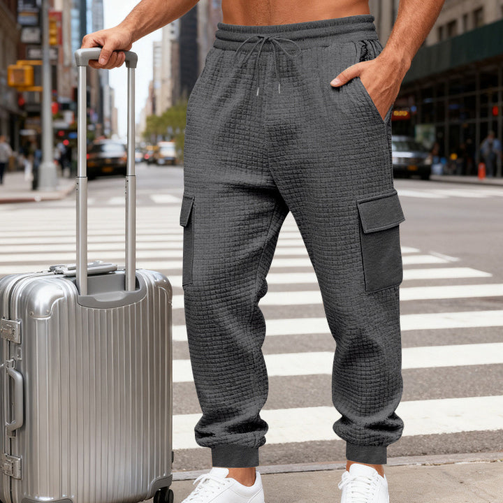 Herren Texturierte Cargo-Jogginghose mit Tunnelzug, aufgesetzten Klappentaschen und gerippten Bündchen – Bravaro