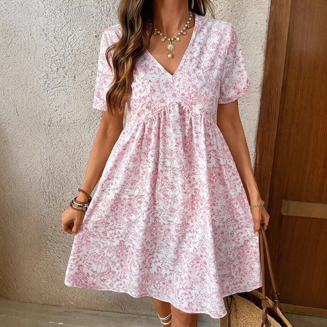 Damen Sommerliches Kleid mit floralem Muster und V-Ausschnitt Echo Archiv
