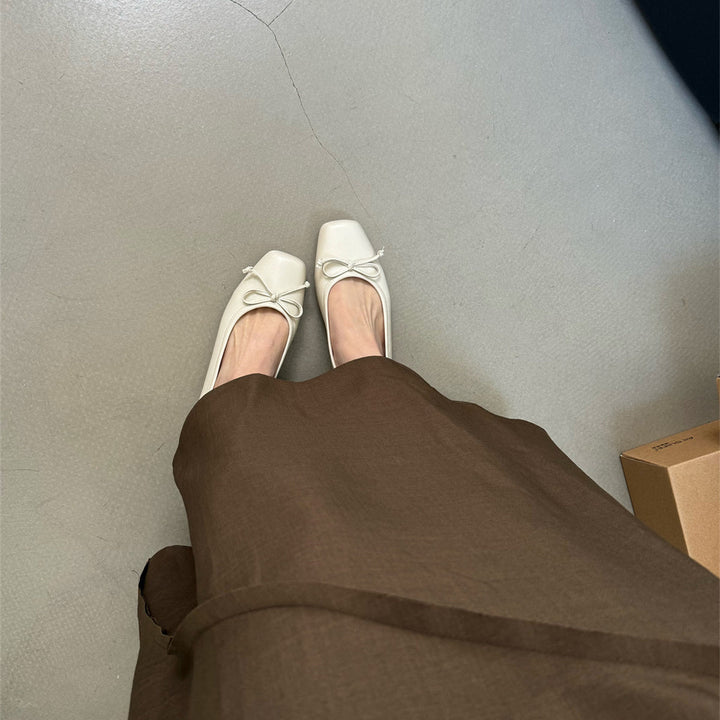 Damen klassisch geschnittene Ballerinas mit zierlichem Schleifenakzent und komfortabler Fußbettung Echoarchiv