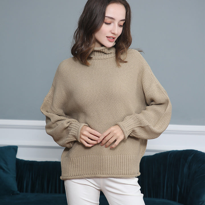 Damen Grobgestrickter Rollkragenpullover mit Ballonärmeln Echo Archiv