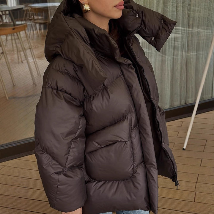 Damen Oversize Steppjacke mit hohem Schalkragen und wattierter Füllung Echoarchiv