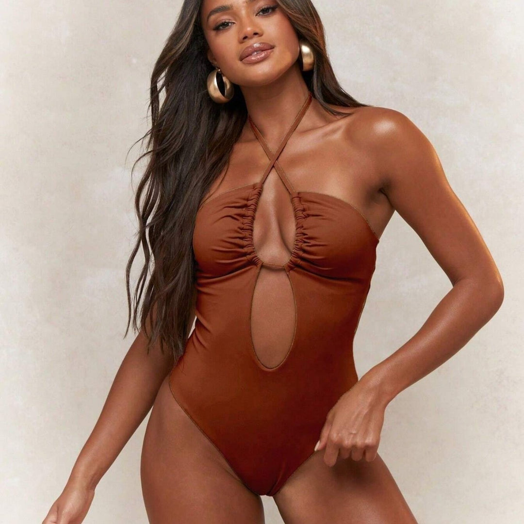 Damen Trendiger Einteiler Badeanzug mit verspieltem Cut-Out Echo Archiv