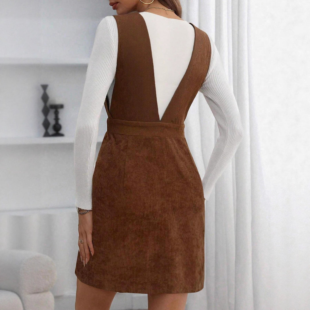 Damen Kord-Latzkleid mit tiefem V‑Ausschnitt, Taillenriegel und A‑Linie – Avérine