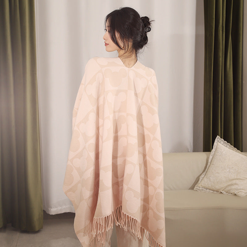 Damen Oversize-Jacquardponcho mit grafischem Kopf-Silhouettenmuster und Fransen – Avérine