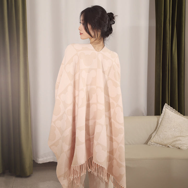 Damen Oversize-Jacquardponcho mit grafischem Kopf-Silhouettenmuster und Fransen – Avérine