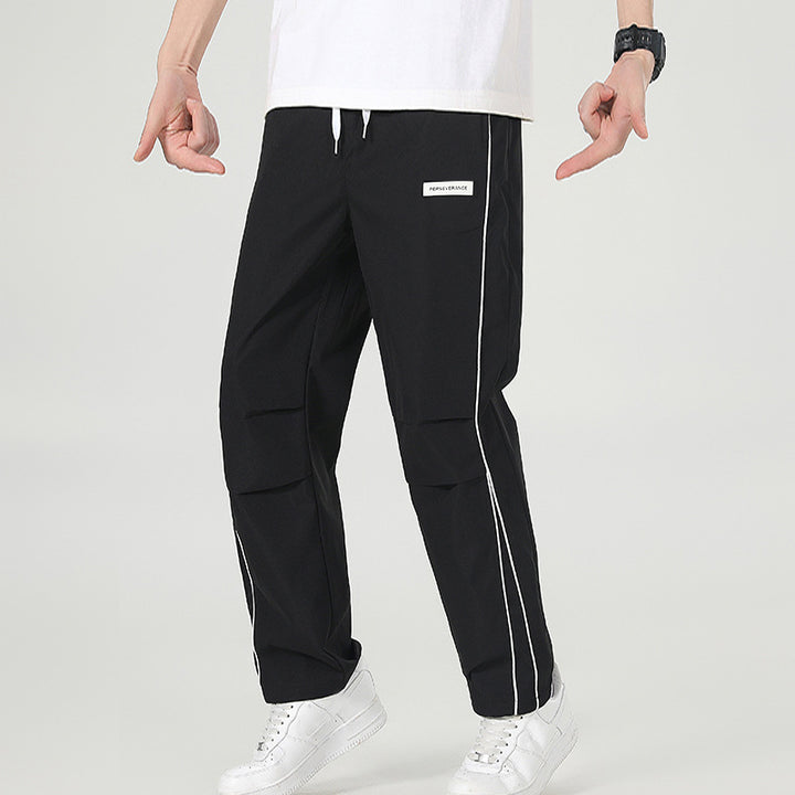 Herren Leichte Technical-Trackhose mit elastischem Bund, Knieabnähern & seitlicher Kontrastpaspel Echo Archiv