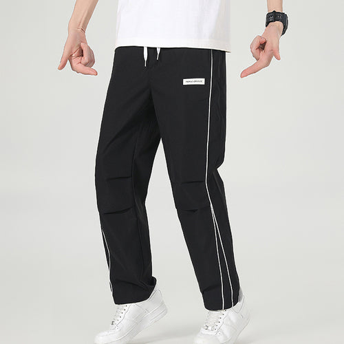 Herren Leichte Technical-Trackhose mit elastischem Bund, Knieabnähern & seitlicher Kontrastpaspel Echo Archiv