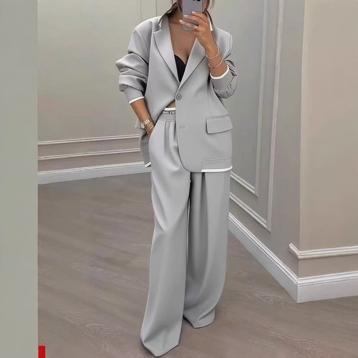 Damen Oversize-Tailoring-Set mit Kontrastpaspel, Single-Button-Blazer und hochgeschnittener Weitbeinhose – Valéne