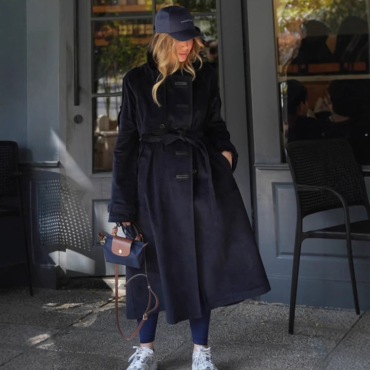 Damen langer Cord-Trenchcoat mit Bindegürtel und Oversize-Schultern Echoarchiv