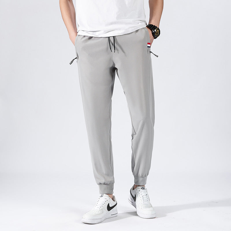 Herren Sportliche Jogginghose mit elastischem Bund und Seitentaschen Echo Archiv