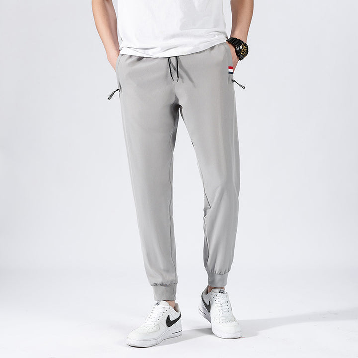 Herren Sportliche Jogginghose mit elastischem Bund und Seitentaschen Echo Archiv
