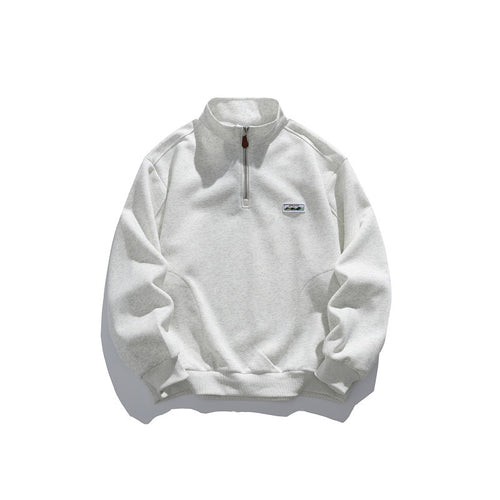 Unisex Halbzip-Sweatshirt mit Stehkragen, Raglanärmeln und minimalistischer Brustpatch Echoarchiv