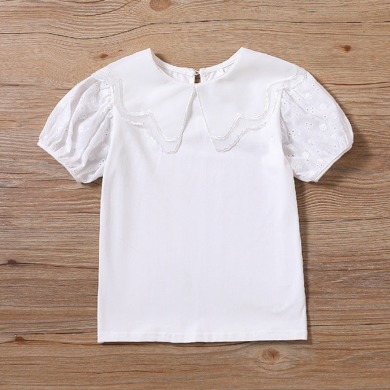 Mädchen Bluse mit dekorativen Lochstickereien und voluminösen Puffärmeln Echo Archiv