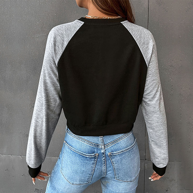 Damen Kurzschnitt-Sweatshirt mit Raglanärmeln und kontrastierenden Ärmeln Echoarchiv
