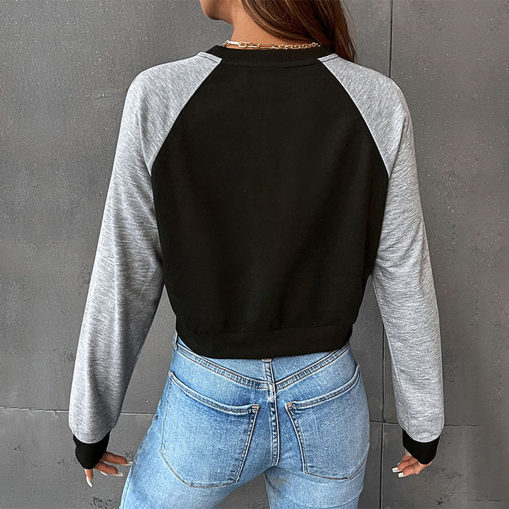 Damen Kurzschnitt-Sweatshirt mit Raglanärmeln und kontrastierenden Ärmeln Echoarchiv