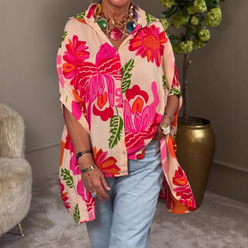 Damen nan luftige Oversize-Hemdbluse im Resortstil mit großflächigem Blumenprint und asymmetrischem Zipfelsaum Echo Archiv