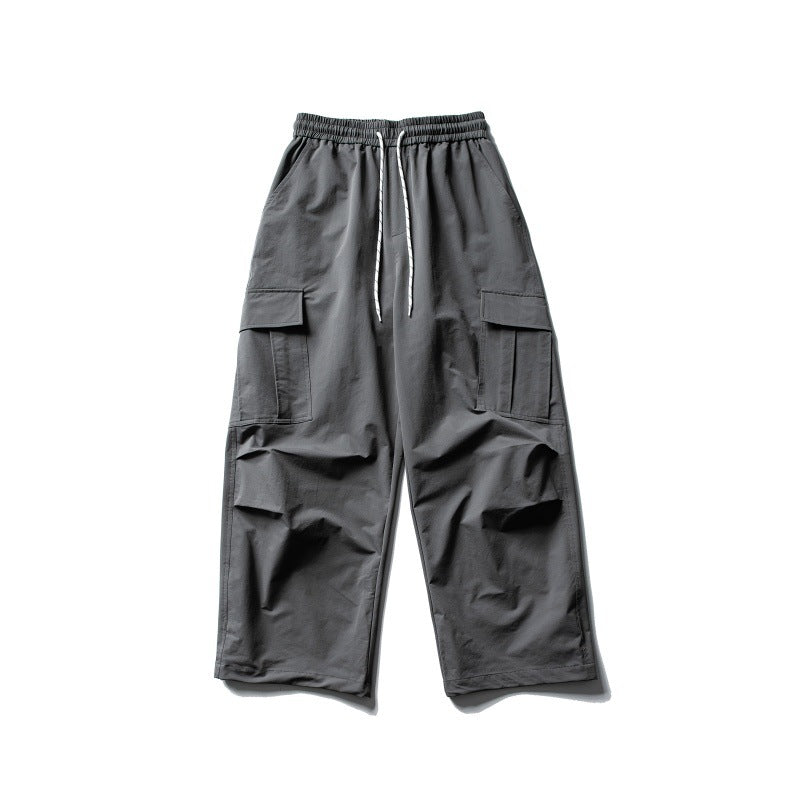 Unisex Weite Cargo-Utility-Hose im Baggy-Schnitt mit elastischem Kordelbund und großzügigen Klappentaschen Echoarchiv