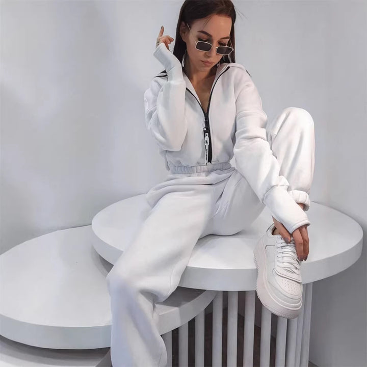 Damen Taillierter Kapuzen-Sweat-Jumpsuit mit Reißverschluss und elastischem Taillenbund – Solévia