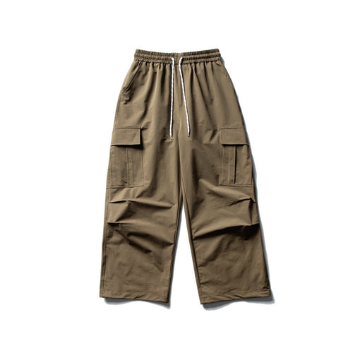 Unisex Weite Cargo-Utility-Hose im Baggy-Schnitt mit elastischem Kordelbund und großzügigen Klappentaschen Echoarchiv