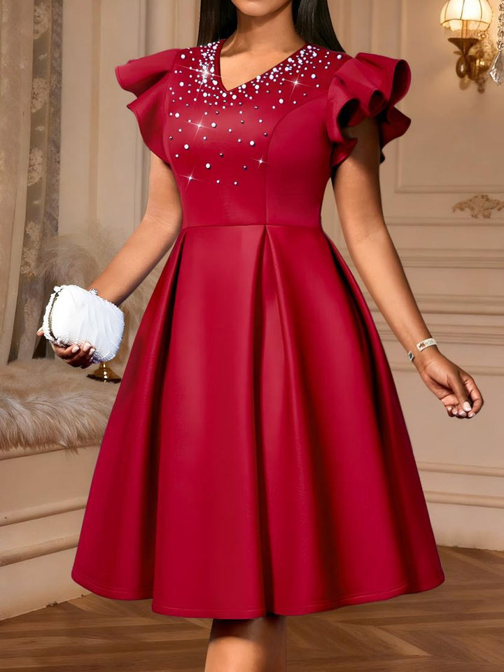 Damen Elegantes Kleid mit funkelndem Strass-Besatz und voluminösen Ärmeln Echo Archiv