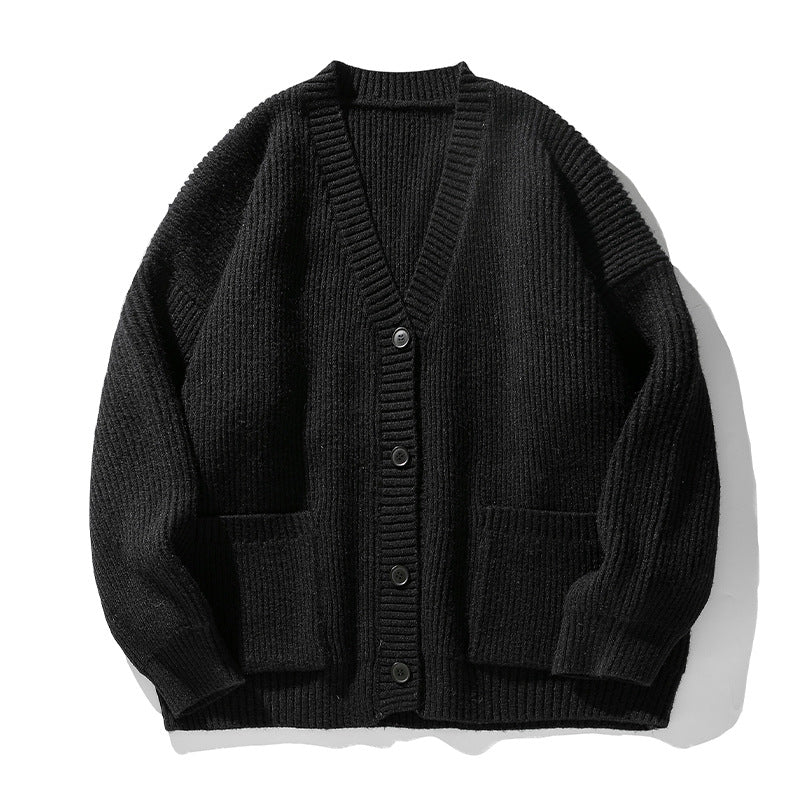 Unisex Oversize Strickcardigan mit V‑Ausschnitt, Knopfleiste und aufgesetzten Taschen Echo Archiv