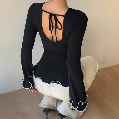 Damen Figurbetontes Langarmshirt mit Volantärmeln und welligem Saum – Avérine