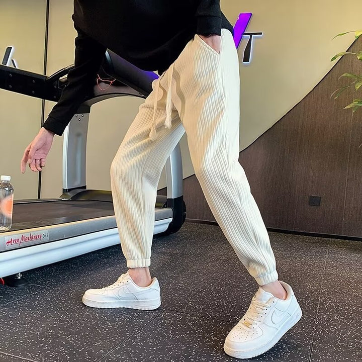 Herren Gerippte Relax-Jogginghose mit Tunnelzug, Eingrifftaschen und elastischen Saumabschlüssen Echoarchiv
