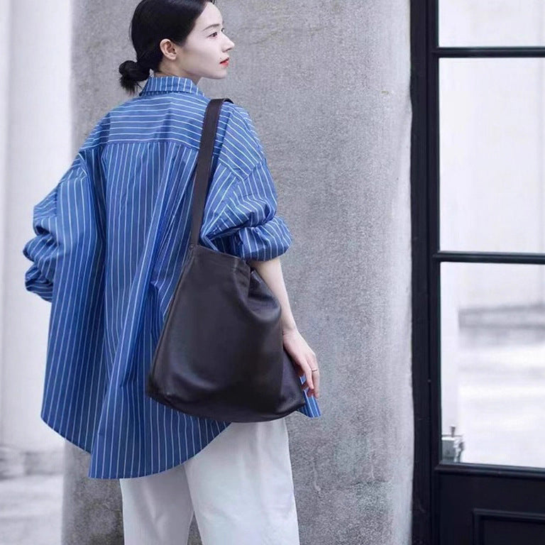 Damen Oversize-Streifenhemd mit verlängertem Saum und kastiger Passform Echoarchiv