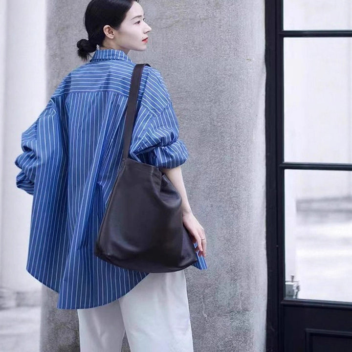 Damen Oversize-Streifenhemd mit verlängertem Saum und kastiger Passform Echoarchiv