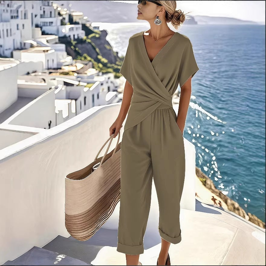 Damen Eleganter Jumpsuit mit Wickeloptik und breiten Beinen Echo Archiv
