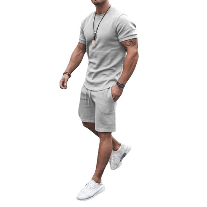 Herren nan figurbetontes Kurzarmshirt mit verstärkter Schulternaht und elastischer Kordelzug-Bermuda aus Stretchjersey Echo Archiv