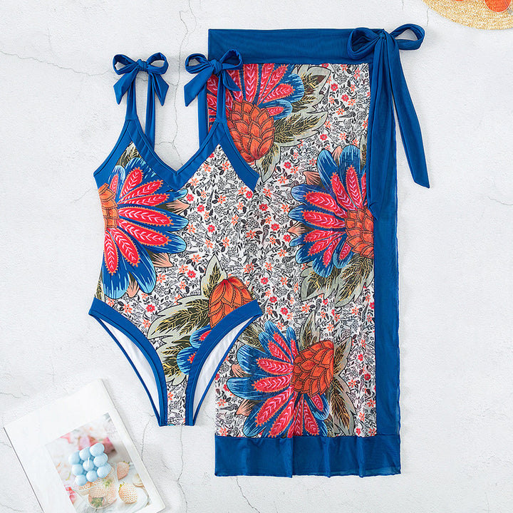 Damen Eleganter One-Piece Badeanzug mit floralem Wickeltuch Echo Archiv