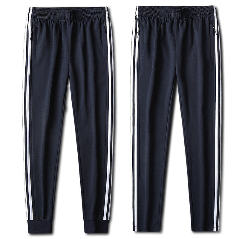 Herren Slim-Fit Trackhose mit seitlichen Kontraststreifen, Reißverschlusstaschen und elastischem Bund – Sorevano