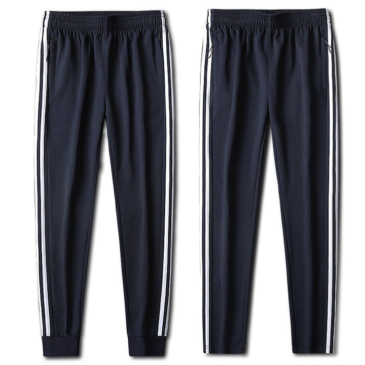 Herren Slim-Fit Trackhose mit seitlichen Kontraststreifen, Reißverschlusstaschen und elastischem Bund – Sorevano