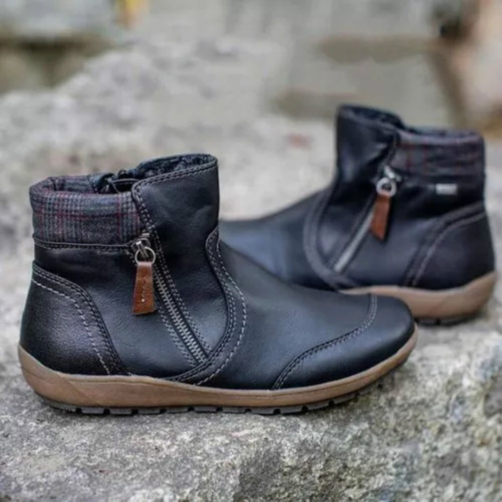Damen nan lederoptik gefütterte Stiefelette mit seitlichem Reißverschluss und rutschfester Laufsohle Echo Archiv