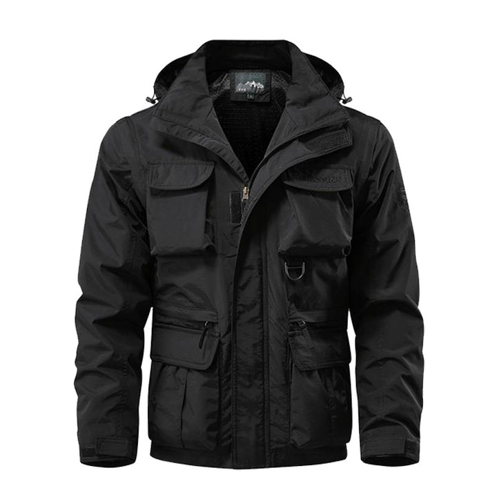 Herren nan multifunktionale Fieldjacke mit Kapuze, zahlreichen Klapp- und Reißverschlusstaschen sowie wind- und wasserabweisender Membran Echo Archiv